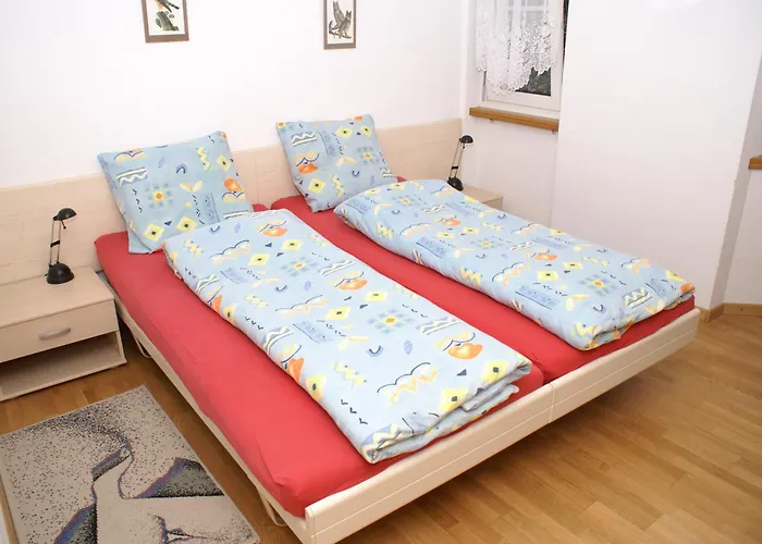 Апартаменты Appartementhaus La Promenade Лойкербад